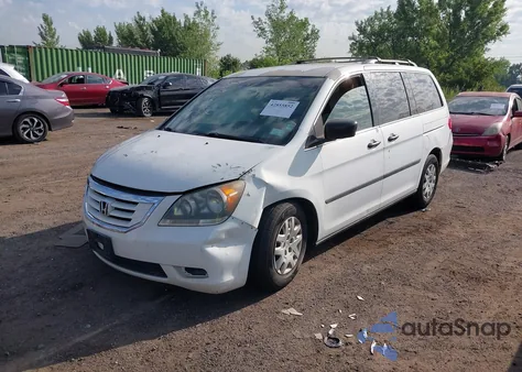 2010 Honda Odyssey Lx z USA, uszkodzony, nr VIN 5FNRL3H21AB037857